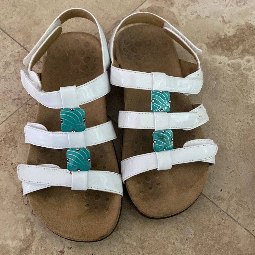 White and turquoise accent strapped sandals